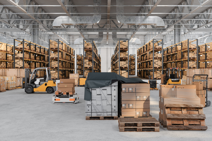 warehouse interior with automated guided vehicles, forklifts, pallets and cardboard boxes